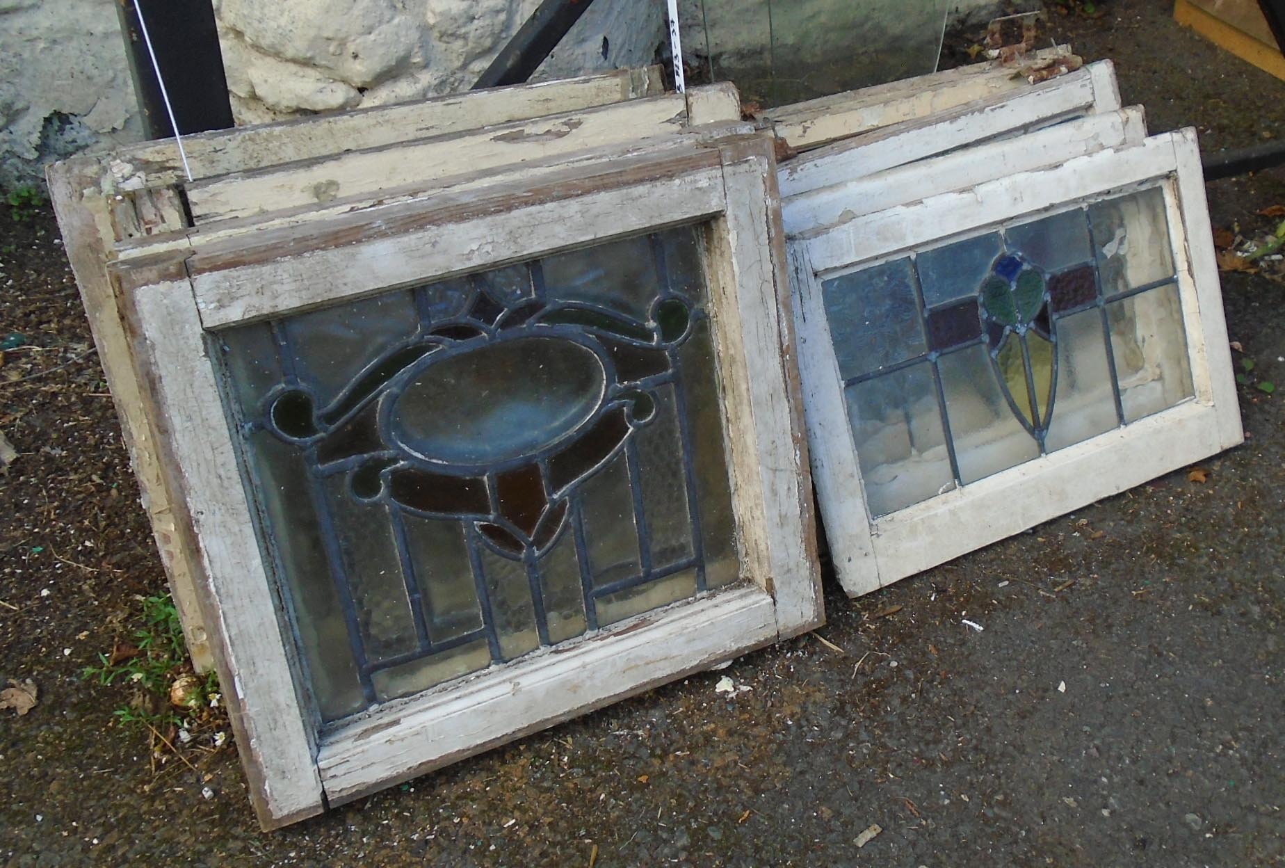 Four matching early 20th Century leaded glass window lights - sold with another four similar