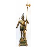 A brass statue of a man-at-arms with halberd and sword, stood on a plinth base - full height 4'