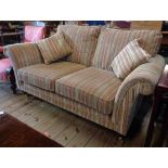 A 5' 10" Parker Knoll two seater settee upholstered in stripped tapestry with two scatter