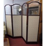 An early 20th Century mahogany framed fourfold dressing screen with heavy bevelled glass plates to