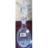 A cut glass decanter