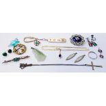 A bag containing assorted jewellery items including marked 9ct. yellow metal pendant, set with