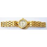 A marked 18k Cartier Panthere lady's wristwatch with Roman numerals, brick-link bracelet and