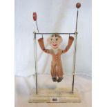 A vintage Jimmy trapeze toy