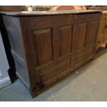 A 4' 1 1/2" antique oak four panel coffer - interior fittings missing