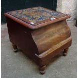 A Victorian mahogany step commode with carpet upholstered lift-top, china liner and turned feet