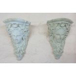A pair of plaster classical style wall brackets