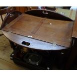 A 3' 8" reproduction mahogany butler's tray, set on a table base with moulded square supports