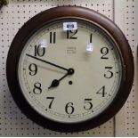 A stained wood cased dial wall timepiece with Perivale spring driven eight day movement