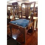 A 19th Century mahogany framed carver chair with pierced splat back, upholstered drop-in seat and