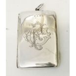 A silver fob money case with engraved monogram - Birmingham 1910