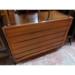 A 3' 3 1/2" retro teak chest of five long drawers, set on plinth base