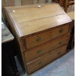 A 35 1/2" 19th Century waxed pine bureau with drawer and shelf fitted interior over two short and