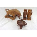 A carved wooden bull, water buffalo head on plaque and a pair of horse head pattern bookends