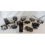 A collection of vintage 35mm and other cameras including folding Agfa, Yashica, folding Korelle,