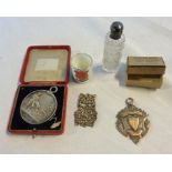 A cased silver swimming medallion - sold with a silver fob, cut glass scent bottle, etc.