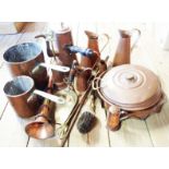 A box containing copper pots, chocolate pot, pans, etc.