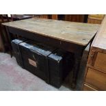 A 5' 2 1/2" Victorian pine scrub top kitchen table, the stained base with two frieze drawers, set on