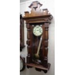 An early 20th Century stained walnut cased Vienna style regulator wall clock with decorative dial,