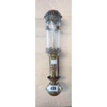 A vintage brass GWR carriage lamp with glass shade