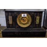 A simulated black slate metal cased mantel clock with Ansonia gong striking movement