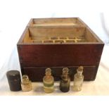 A 19th Century stained pine medicine box with later fitted interior, drawer and flush handles - sold
