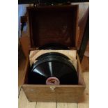 An oak case containing a collection of 78rpm records including Dame Nellie Melba and Caruso
