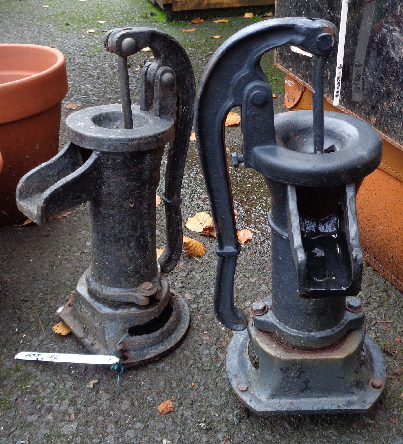 Two cast iron hand pumps