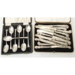 A case containing seven matching rat tail teaspoons with scroll terminals - sold with a case