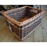 A 21 1/2" wicker log basket
