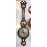 A 19th Century oak cased barometer/thermometer with storm dial to top, convex mirror and spirit