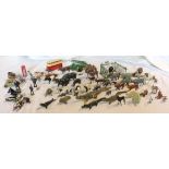 A collection of early 20th Century Britains and other painted diecast metal zoo animals including