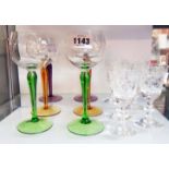 Six hock glasses with coloured stems - sold with five etched and cut sherries
