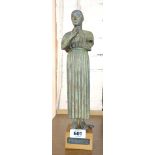 A handmade museum replica of the Greek statue the Charioteer of Delphi