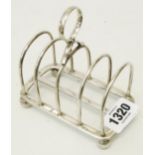 A silver toast rack - London 1909