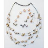A suite of wire set pink cultured pearl jewellery, comprising necklace, bracelet and two pairs of