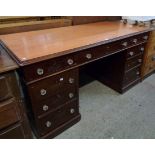 A 5' early 20th Century mahogany twin pedestal desk by J. Maple & Co., London with later Formica