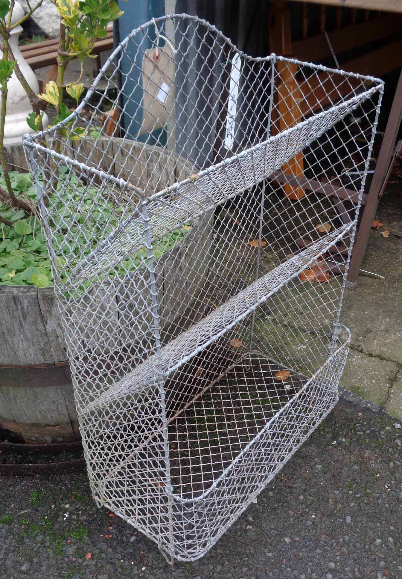 A vintage wirework three tier vegetable rack