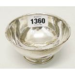 A silver pedestal sugar bowl