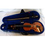 A soft cased 1/2 size Stentor violin