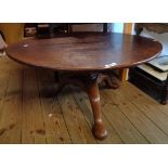 A 3' 4 1/2" antique mahogany pedestal table, set on reduced pillar and tripod base with pad feet