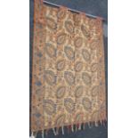 An antique woven silk wall hanging with palmette main in a floral border- re-cut from a throw, 47" X