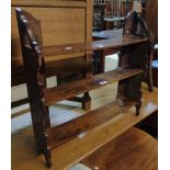 A 25" 19th Century stained wood wall hanging three shelf open bookcase with shaped and pierced ends