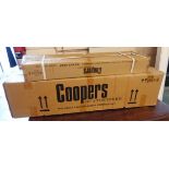 A boxed Coopers chain saw and hedge trimmer set and boxed accessories set - both as new