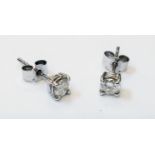 A pair of 9ct. white gold diamond stud ear-rings - approx. 0.5 TDW