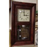 A late 19th Century stained wood cased American wall clock by Jerome & Co. with twin weight driven