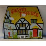 An enamelled sign for Devon Toffee by Garnier & Co. London