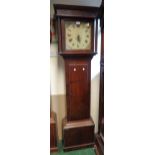 An antique stained oak longcase clock with white painted square dial and thirty hour movement