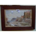 An oak framed 19th Century watercolour, depicting a fishing village with cliffs and sailing