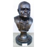 A bronzed bust of Winston Churchill set on a marble socle - full height 12 1/2"